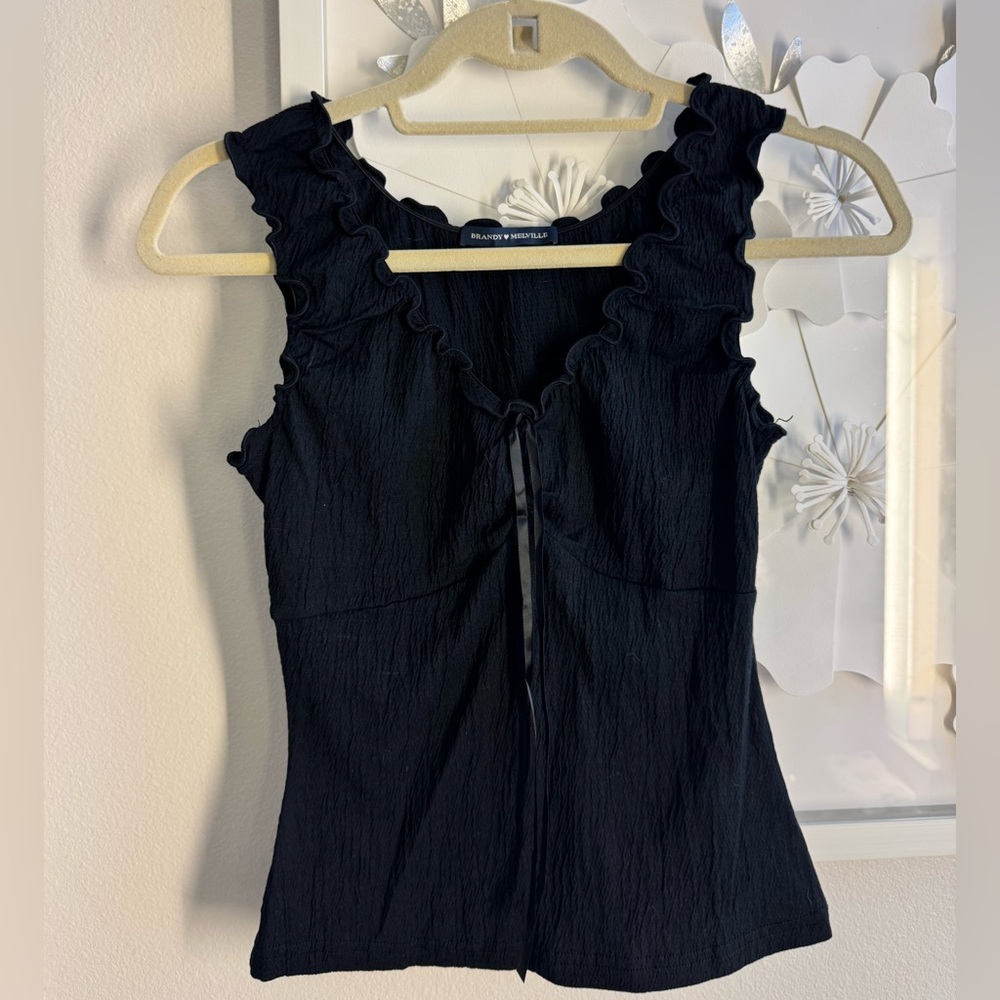 Brandy Melville ruffle tank top. Never worn, one size.